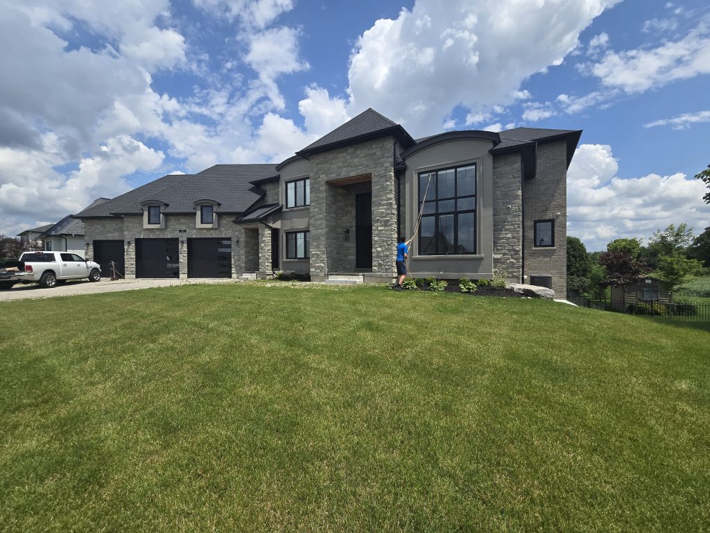 Window Cleaning on a massive house in Brantford Ontario